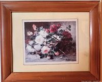 Front view showing signed floral print, mat, wood frame