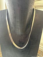 Full view of necklace on display bust