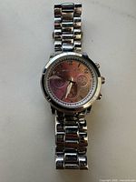 Full view of Michael Kors silver-tone watch with bracelet band