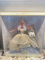 Front of boxed Celebration 2000 Barbie showing doll and ornament