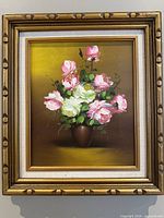Full view of framed floral oil painting