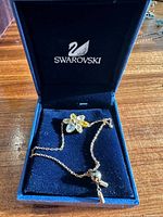 Bracelet in open Swarovski box showing flower crystal detail and chain