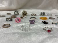 Group shot showing variety of fantasy rings, assorted designs and materials