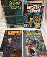 Front covers of all four comics laid out together