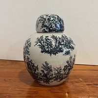 Front view of blue and white ceramic ginger jar with lid