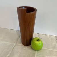 front view showing cylindrical form and open side