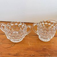 Full view of both matching pressed glass pieces