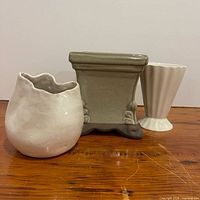 Front view of all three ceramic pieces