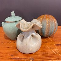 All three decorative pieces side by side