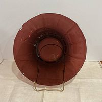 Full front view of round amethyst glass platter on stand
