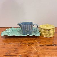 Tray, pitcher and jar grouped together