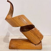 side view showing angled cradle and base