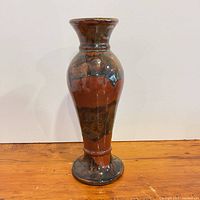 Full view of ceramic pillar candle holder front profile