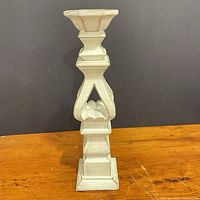 Full view of wooden candlestick showing overall design