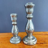 Front view showing both candlesticks and relative heights