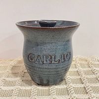 Front view showing GARLIC lettering, glaze colour, shape