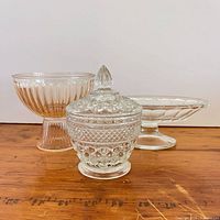 All three pressed glass pieces grouped together