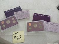 Both 1988 and 1989 proof sets with sleeves and specification cards