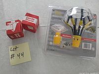 Sealed bulb changer kit with two boxed candle shavers