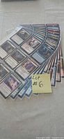 Stack of ten plastic binder pages each filled with Magic: The Gathering cards