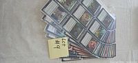 Stack of binder sleeves filled with Magic: The Gathering cards