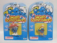Front of both Smurfs figures on blister cards