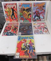 Group shot of all seven bagged Spider-Man comics