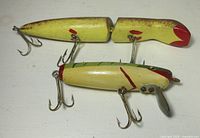 Jointed and straight lures top view showing paint and hooks