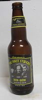 Full view of brown glass Three Stooges beer bottle