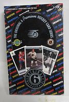 Front of sealed box showing branding, sample cards and 36 count note