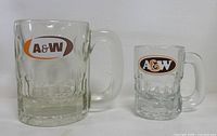 Front view showing both mug sizes and A&W logos