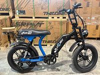 Side profile of Bluerev Moto81 M-750 e-bike showing frame, seat, tires, lights