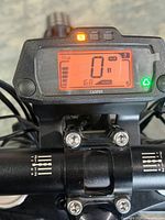 Digital instrument cluster showing 168 km odometer