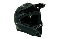 Three-quarter right view of matte black full-face helmet showing peak visor and chin guard