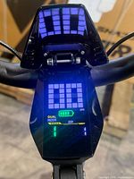 LCD handlebar display showing battery and mode