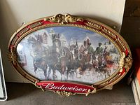 Front view showing Budweiser Clydesdales scene and decorative frame