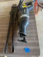 Reciprocating saw and bolt cutter full view