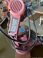 Close-up of Chicago Electric Power Tools label on motor head with cords visible