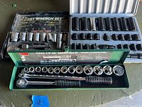 View of all three socket sets showing contents and cases