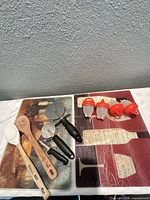 Entire lot showing glass covers, utensils, egg poachers