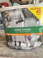 Front of bag showing CVS Health fitted briefs, 40 count, maximum absorbency