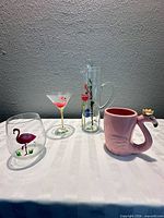 Group shot of all five flamingo-themed drinkware items