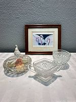 Group shot showing framed print and three glass pieces