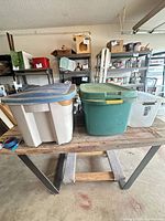 All three storage totes on workbench