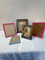 All five frames grouped showing sizes and colors