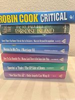 Spines showing six identifiable titles