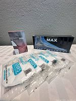 Nanomax box, MAX foot treatment box, sealed KN95 masks grouped