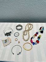 Full layout of all jewellery items on table