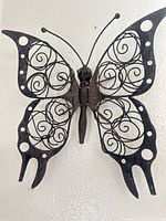 Scrollwork butterfly wall art piece