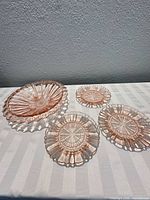 overall view of compote bowl with three plates